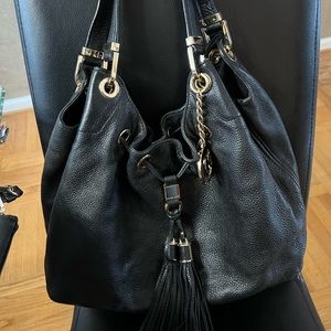 Large USED Black MK shoulder bag with gold hardware.